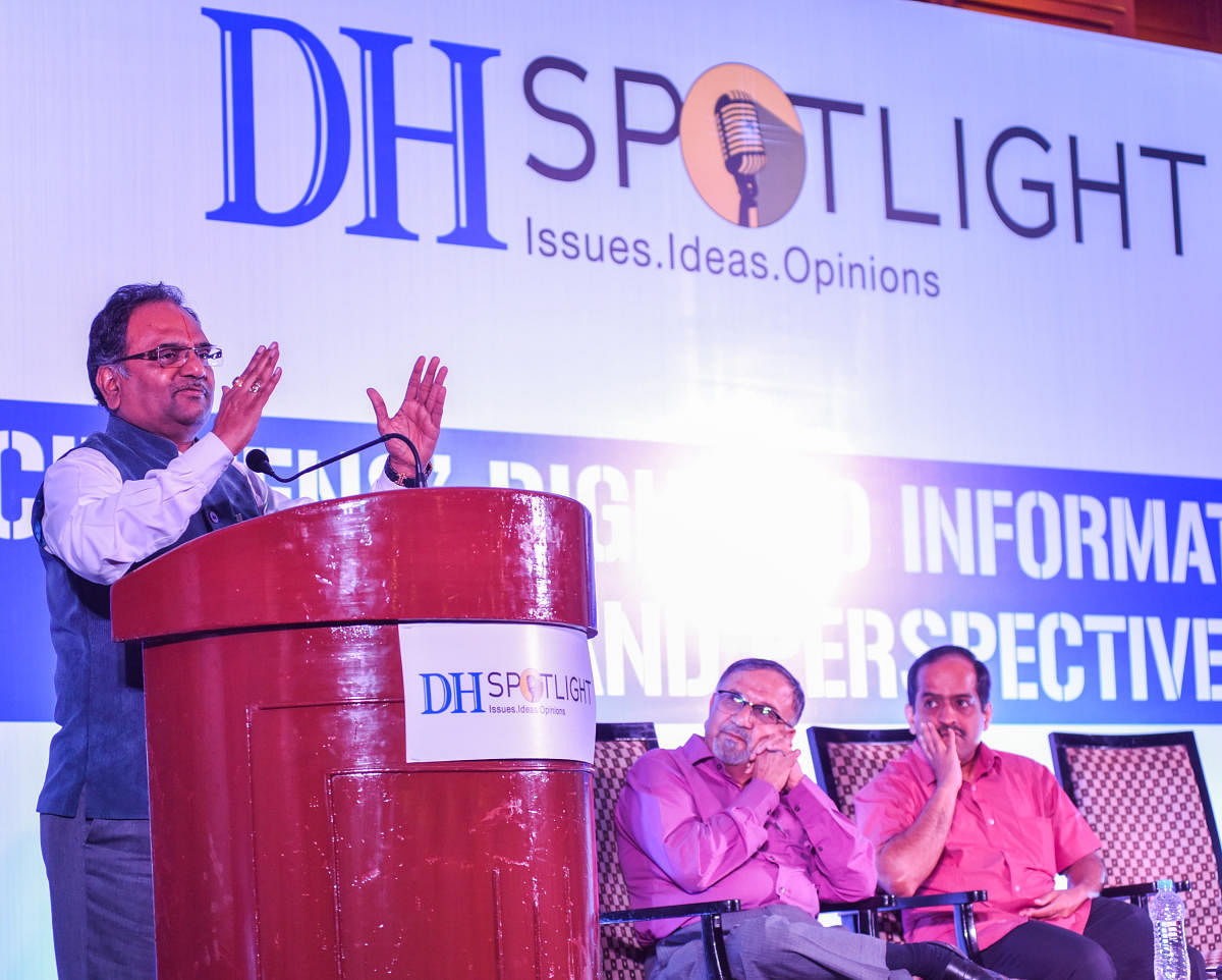 Central Information Commissioner M Sridhar Acharyulu speaks at a DH Spotlight event on ‘Citizens’ Right to Information: Issues and Perspectives’ in Bengaluru on Saturday. Former CIC Shailesh Gandhi and RTI activist Venkatesh Nayak are seen. DH PHOTO/S K DINESH