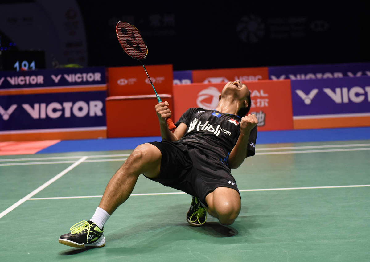 ECSTATIC: Indonesia's Anthony Sinisuka Ginting celebrates his win over Japan's Kento Momota in the men's final of the China Open. AFP