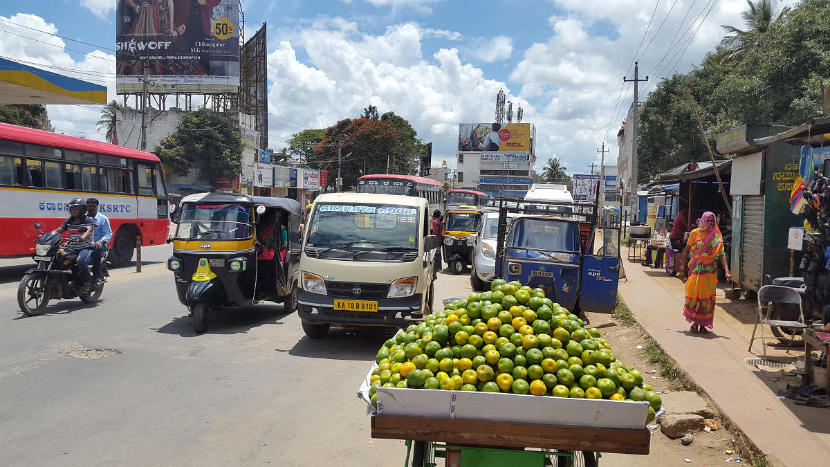 Vehicles near the KSRTC bus stand on IG Road in Chikkamagaluru.