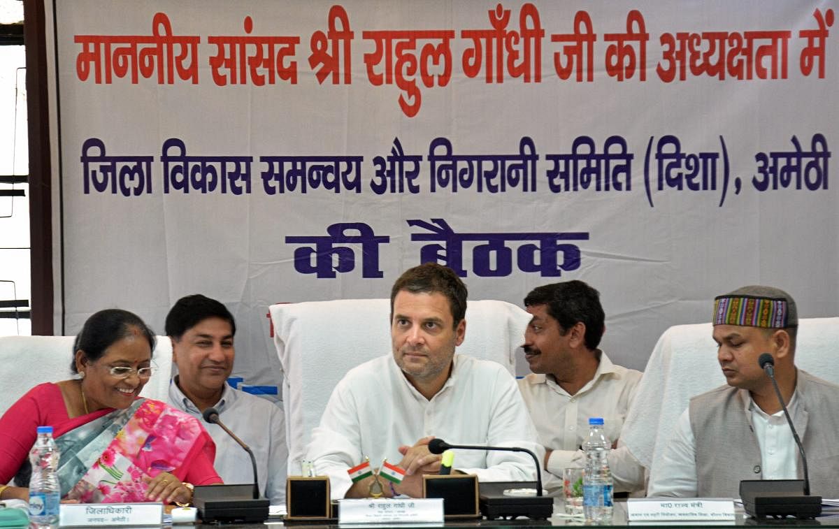 Congress president Rahul Gandhi presides over a meeting, on a two-day visit to his Parliamentary constituency of Amethi on Tuesday. PTI