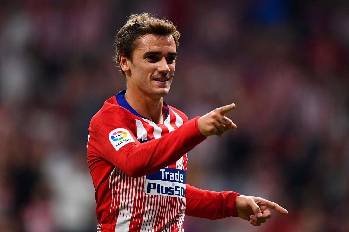 Atletico Madrid's Antoine Griezmann celebrates after scoring against SD Huesca in Madrid on Tuesday. AFP