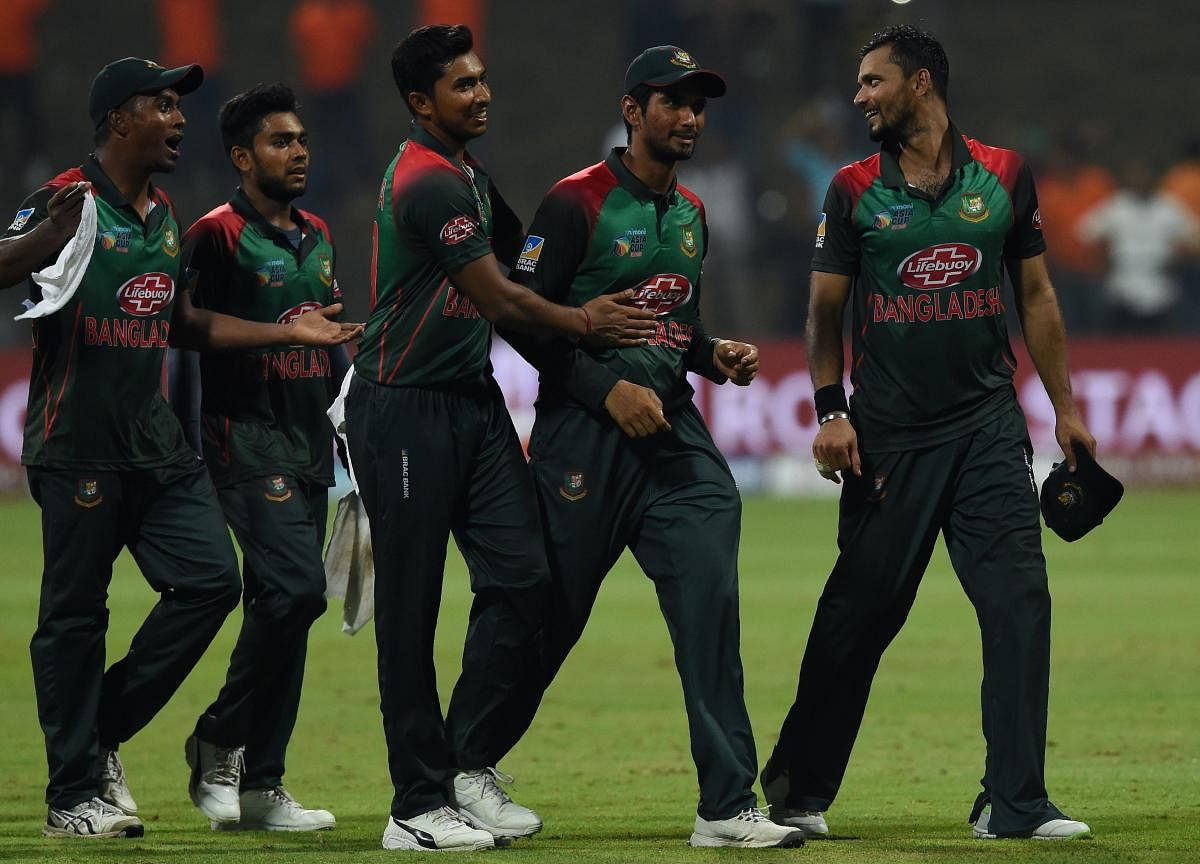 Having led his team into the final, Mashrafe Mortaza (right) will look to scalp India in the final for Bangladesh's maiden Asia Cup title. AFP