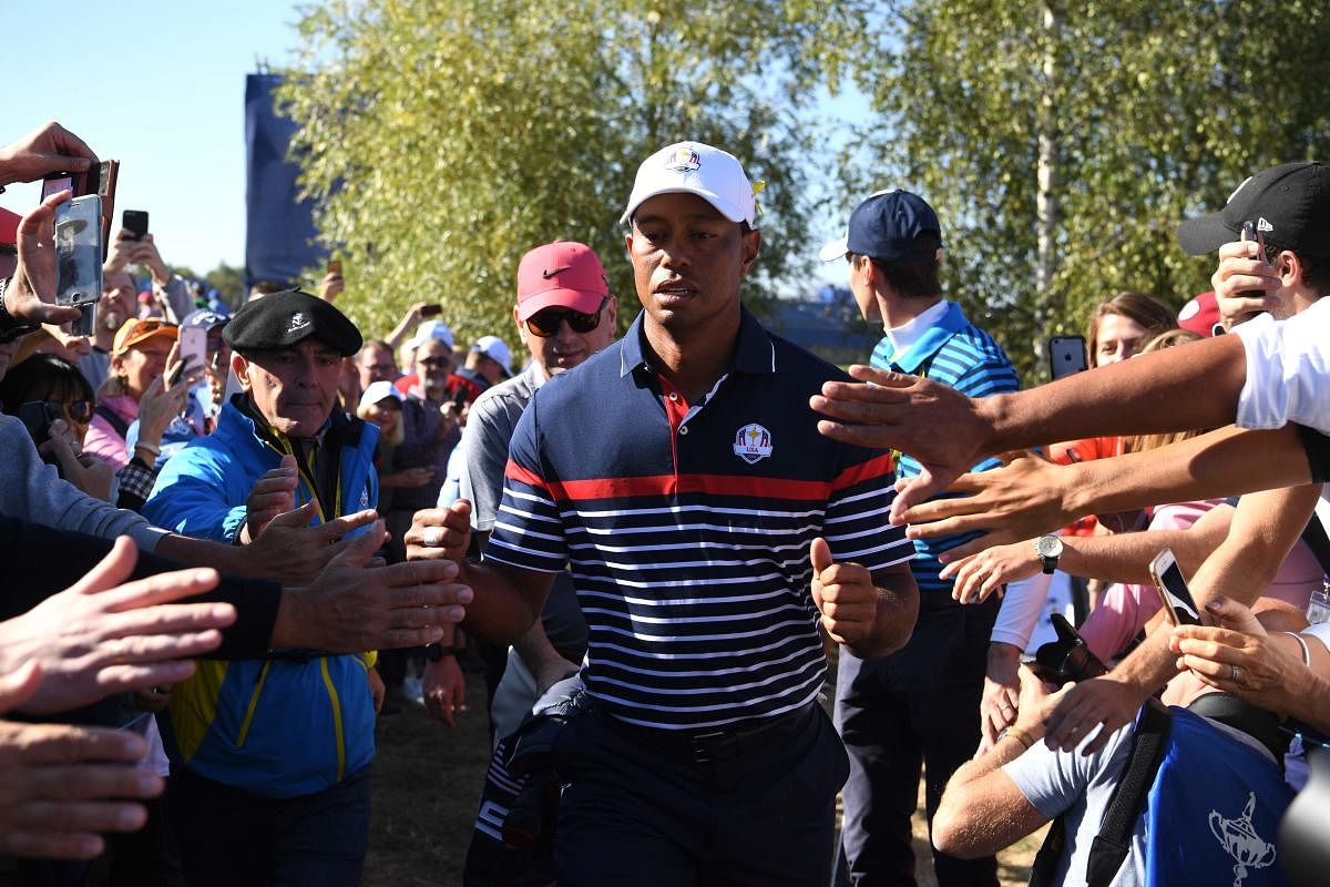 Although Tiger Woods is an American, he's set to get a raucous reception from the fans at Le Golf National Course when the Ryder Cup kicks off on Friday. AFP