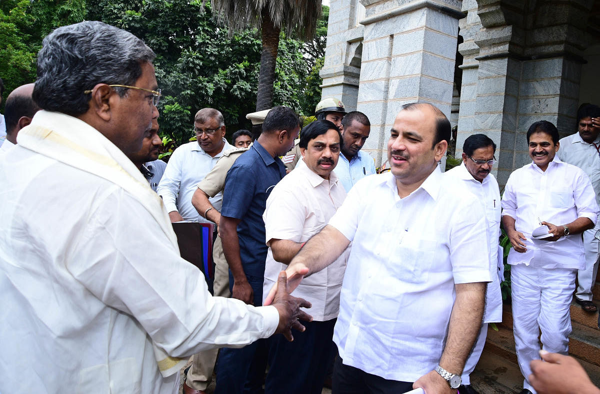 JD(S) national general secretary Danish Ali greets former chief minister Siddaramaiah ahead of the co-ordination committee meeting of the coalition government in Bengaluru on Thursday.