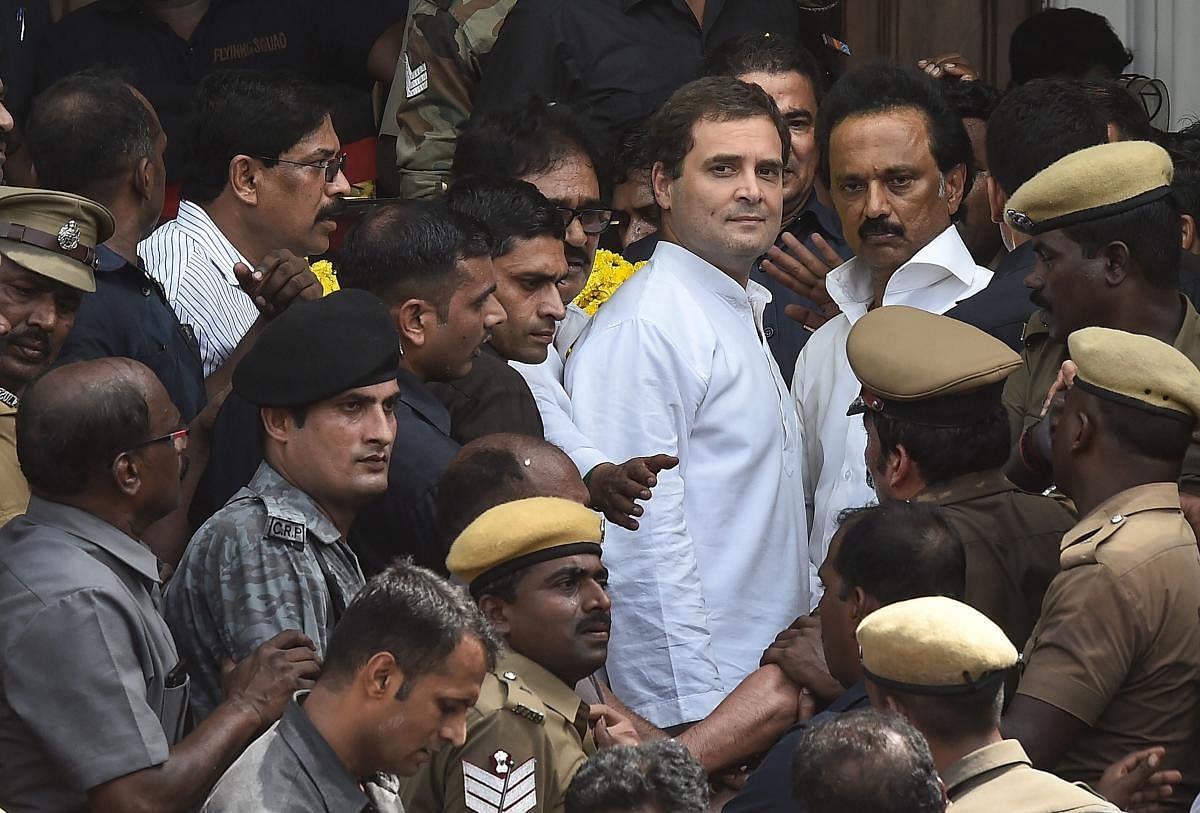Congress president Rahul Gandhi with DMK Working President MK Stalin after paying his last respects to DMK chief M Karunanidhi, at Rajaji Hall in Chennai on Wednesday. PTI Photo