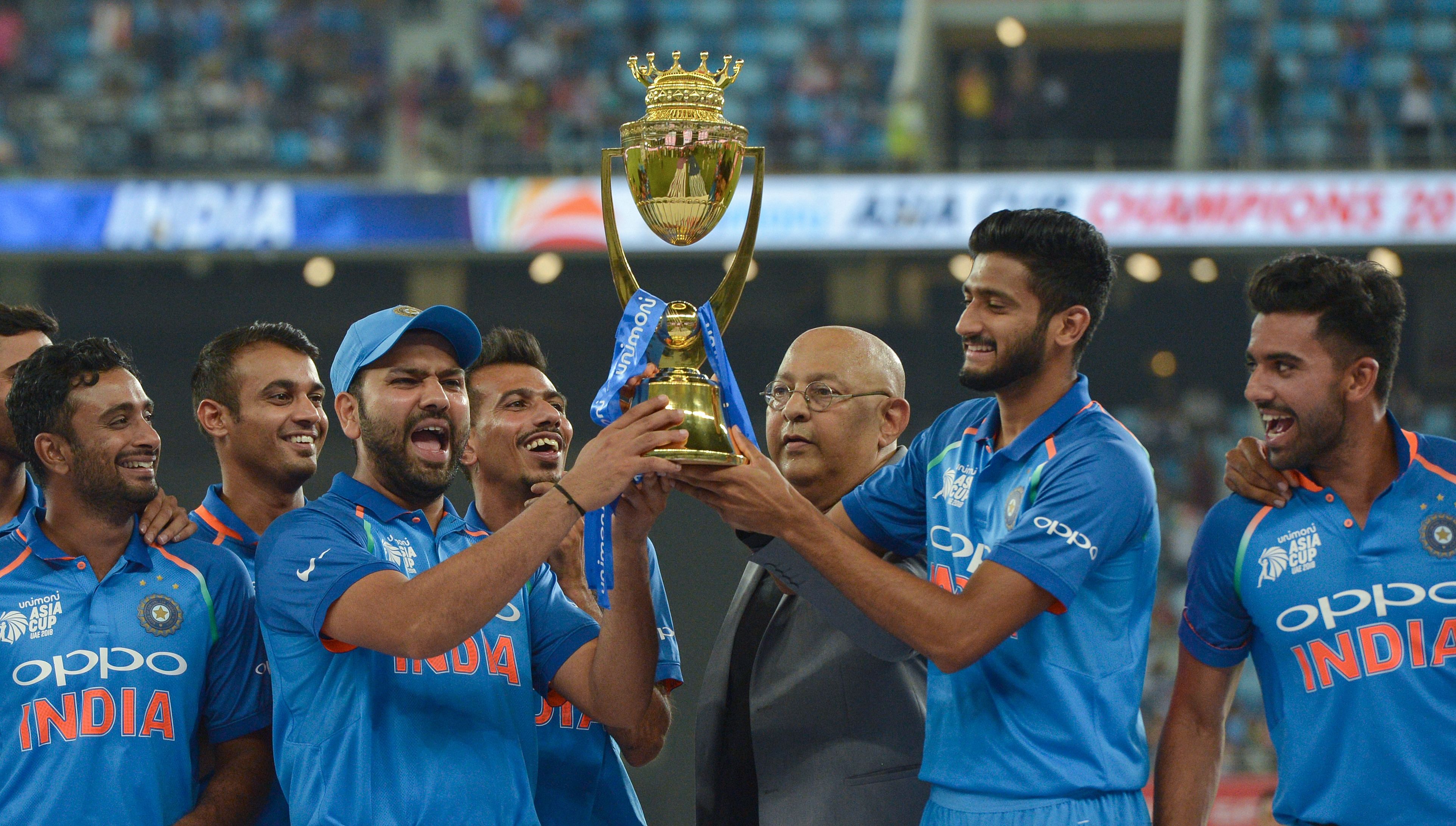India captain Rohit Sharma and team celebrate after winning the Asia Cup at the Dubai International Cricket Stadium on Friday. (AFP)