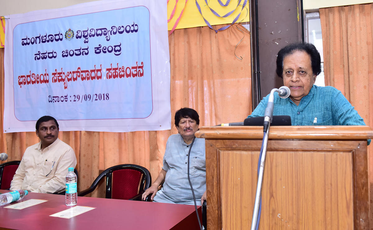 Former education minister Prof B K Chandrashekar speaks at a dialogue on secularism at Mangalore University on Saturday.