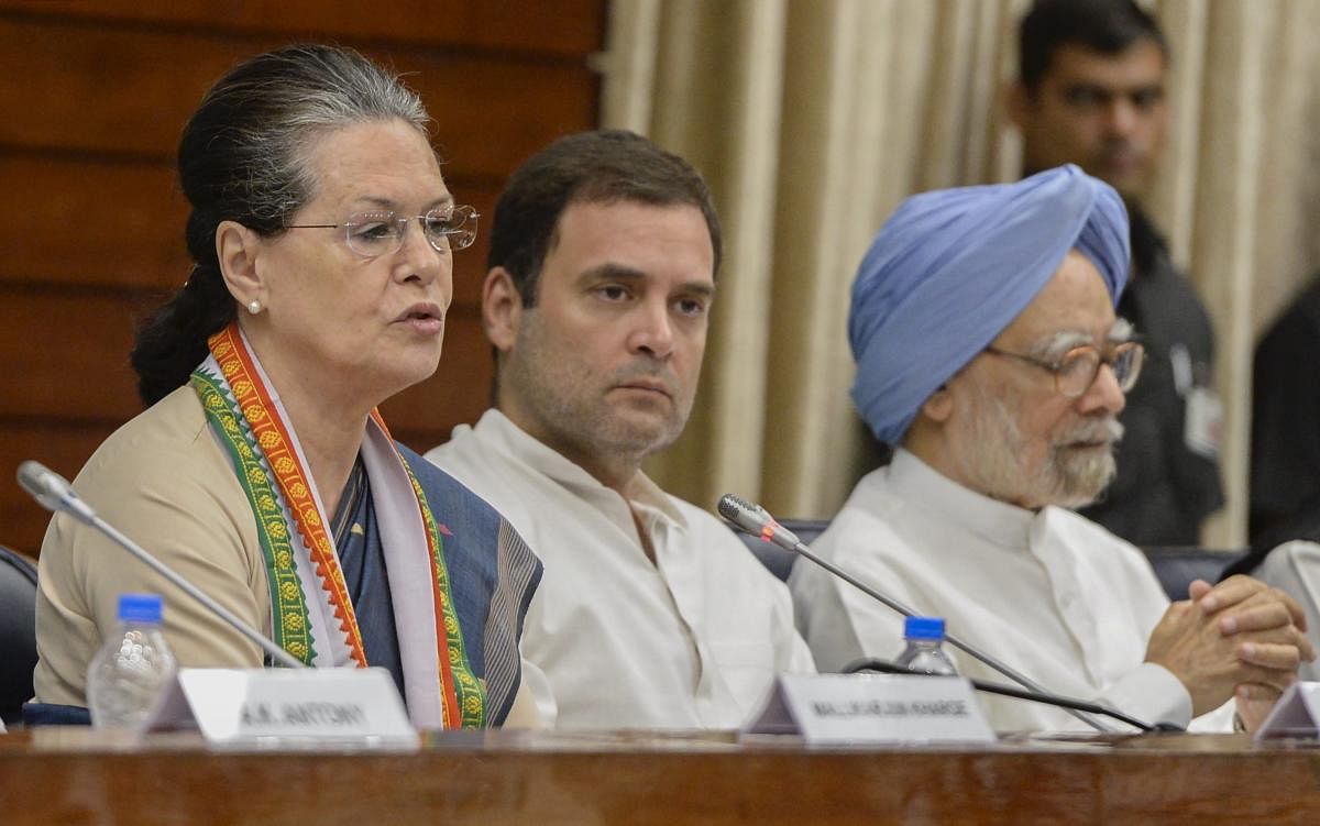 Former Congress president Sonia Gandhi, president Rahul Gandhi and former prime minister Manmohan Singh. (PTI Photo)