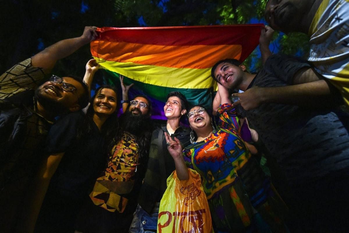 LGBTQ community members celebrate after the Supreme Court verdict which decriminalises consensual gay sex, in New Delhi, Thursday, Sept 06, 2018. A five-judge constitution bench of the Supreme Court unanimously decriminalised part of the 158-year-old colo