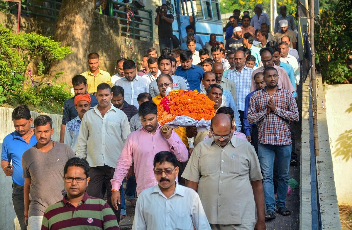 People attend the funeral procession of the private company executive Vivek Tiwari, who was reportedly shot dead by a police constable in Lucknow, on Sunday. (PTI Photo)