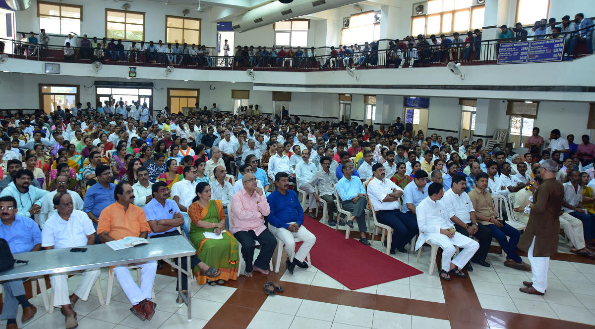 People and elected representatives participate in the screening of a ‘Mann Ki Baat’ programme at the T V Raman Pai Convention Centre in Mangaluru on Sunday.