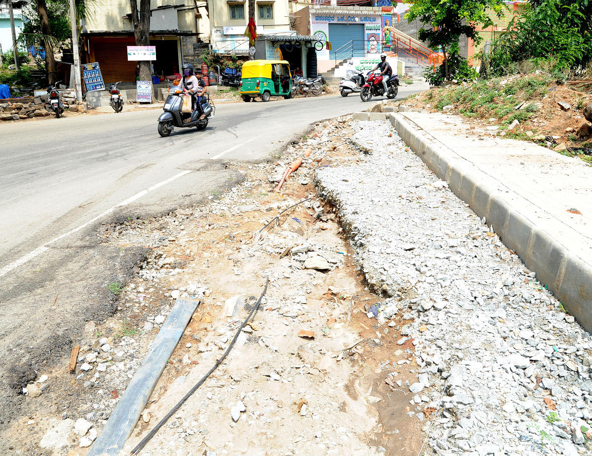 The OFC cable companies left out with out proper repair of the dug-up road at Vasantapura of Bengaluru south on Wednesday. Photo Srikanta Sharma R.