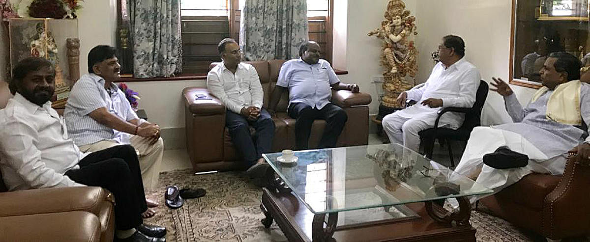 Chief minister H D Kumaraswamy along with Eswar Khandre, D K Shivakumar, Dinesh Kundu Rao, deputy chief minister Dr. G Parameswara and former chief minister Siddaramaiah having a meeting at Siddaramaiah's residence in Bengaluru on Friday.