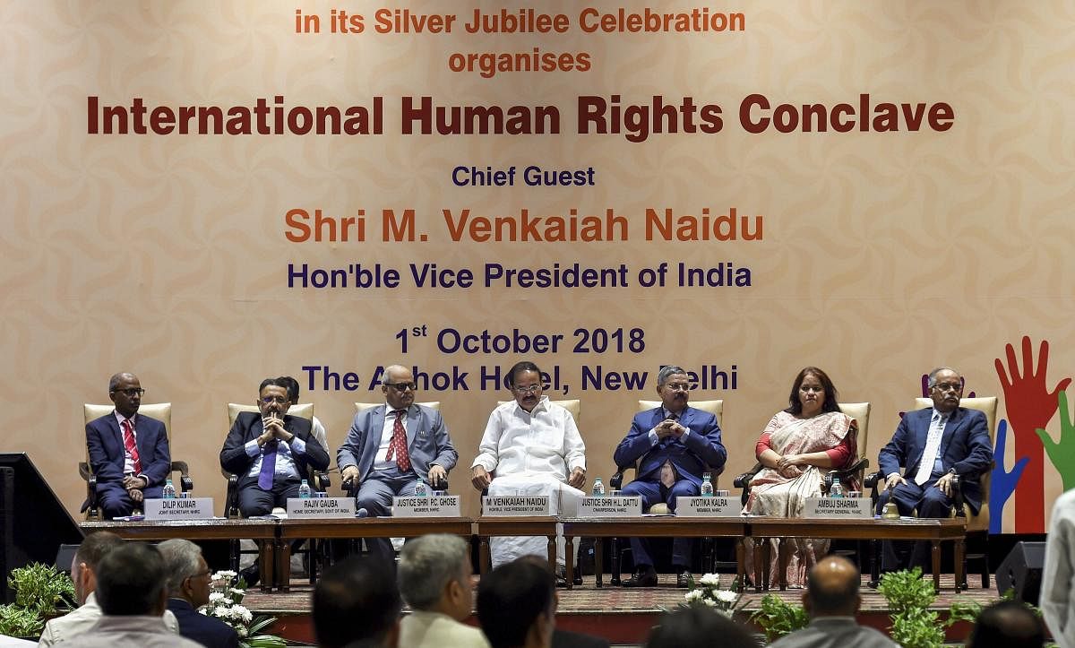 Vice President M Venkaiah Naidu (c), National Human Rights Commission (NHRC) Chief Justice H L Dattu (3rd R) and others during the silver jubilee celebration at NHRC, in New Delhi on Monday, Oct 01, 2018 (PTI Photo)