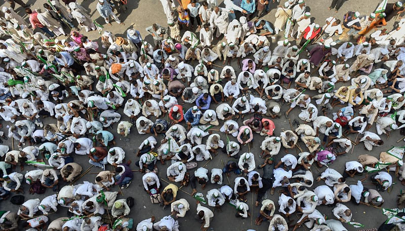 Farmers sit in protest at Delhi-UP border during 'Kisan Kranti Padyatra' in New Delhi. (PTI Photo)