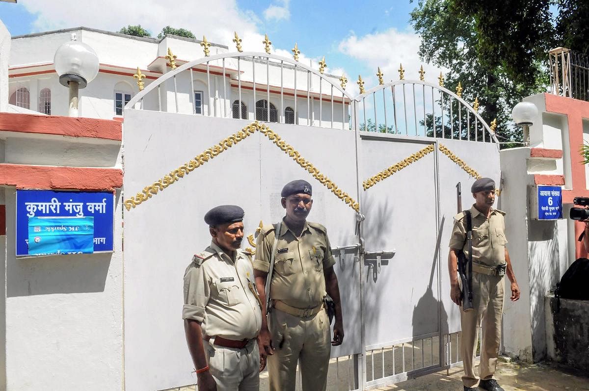 Police personnel outside former social welfare minister Manju Verma's residence during CBI raid in connection with Muzaffarpur shelter home rape case, in Patna on Friday. PTI