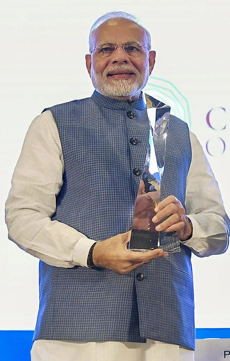 Prime Minister Narendra Modi after receiving the UN's highest environmental honour 'Champions of The Earth Award' at a special ceremony, in New Delhi on Wednesday. PTI