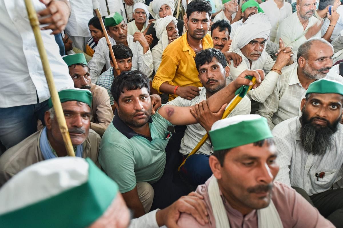 The massive farmers' protests that kept the Modi government on tenterhooks melted in the early hours of Wednesday