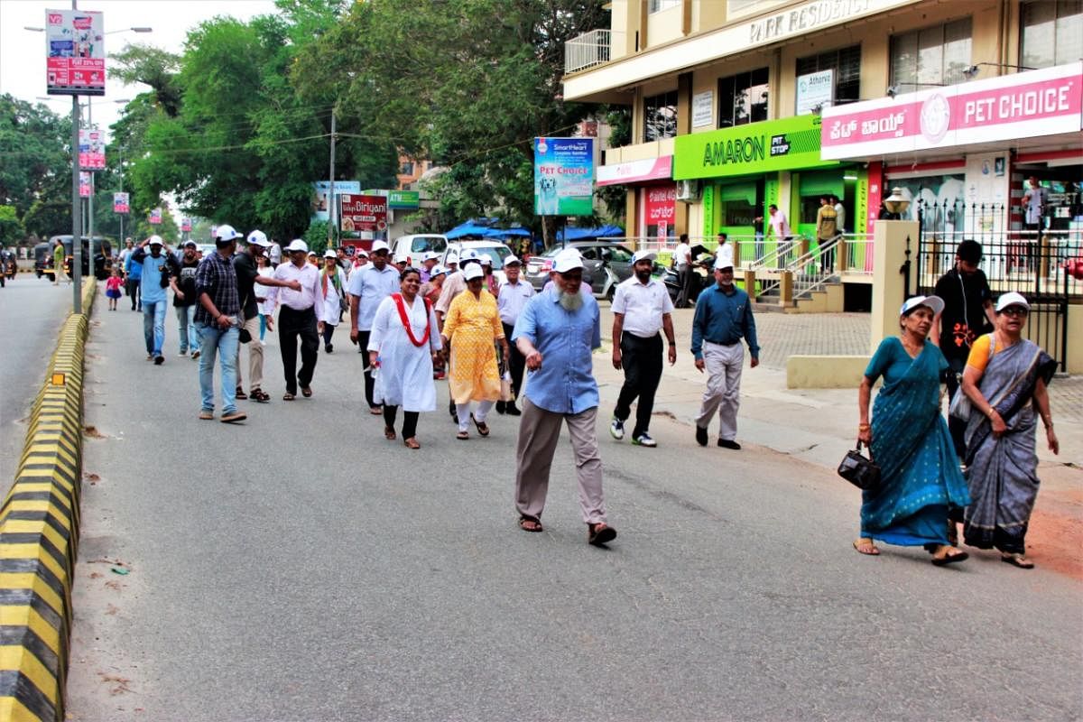 Senior citizens, students and staff of Occupational Therapy Department, School Of Allied Health Sciences, Manipal, take part in the walkathon in Udupi.