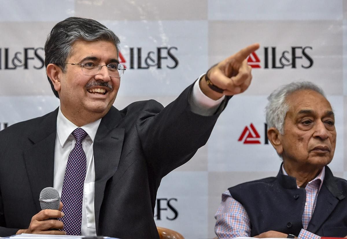 Uday Kotak, newly appointed non-executive chairman of IL&amp;FS, speaks during a press conference in Mumbai, Thursday. Newly appointed CMD Vineet Nair is also seen. (PTI photo)