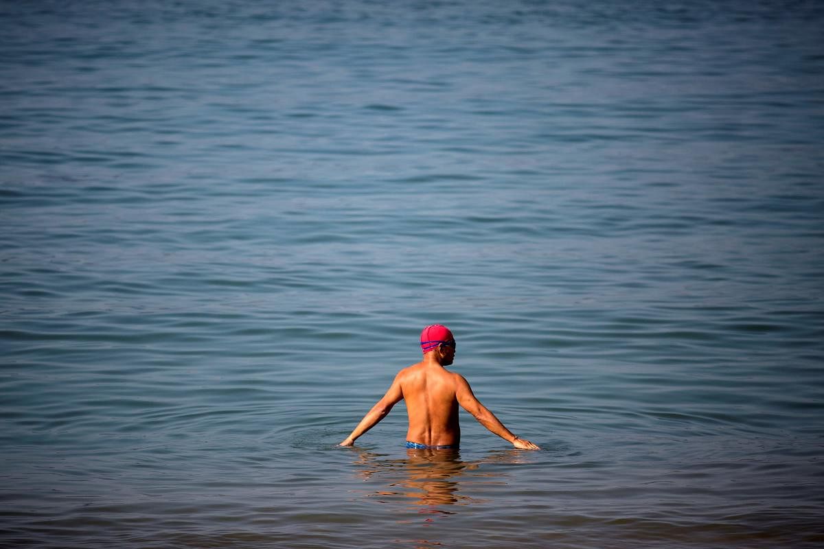 New research in Hong Kong has found that UV filters commonly used in sunscreen are polluting surrounding waters and could endanger human health. AFP File