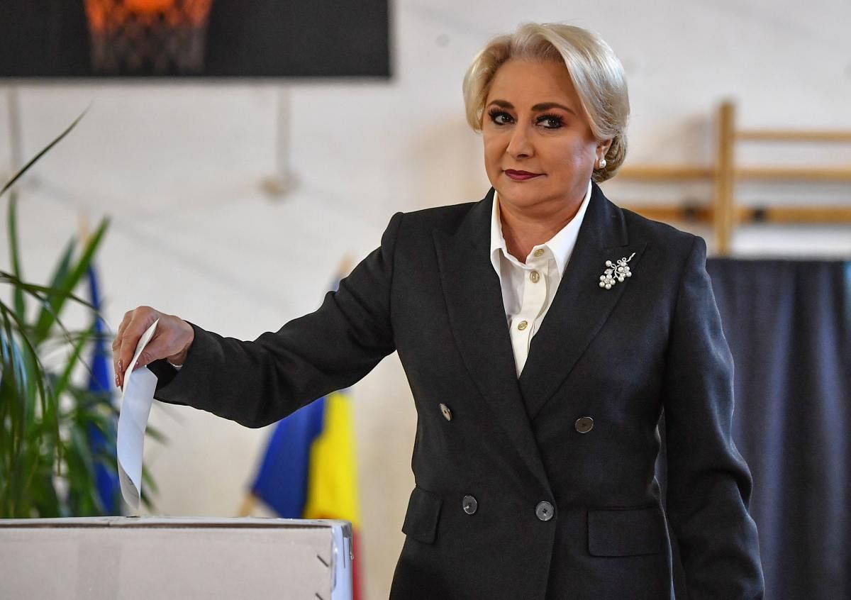 Romanian Prime Minister Viorica Dancila casts her ballot in a referendum to change the constitutional definition of "family", at a polling station in Bucharest on October 6, 2018. AFP