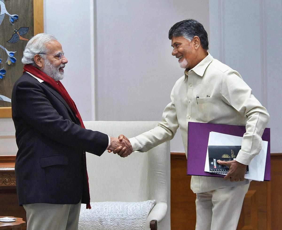Prime Minister Narendra Modi with TDP President and Andhra Pradesh Chief Minister N Chandrababu Naidu. (PTI file photo)