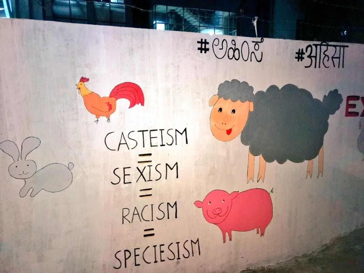 A wall art promoting veganism. Activists say that it is a social justice moment.