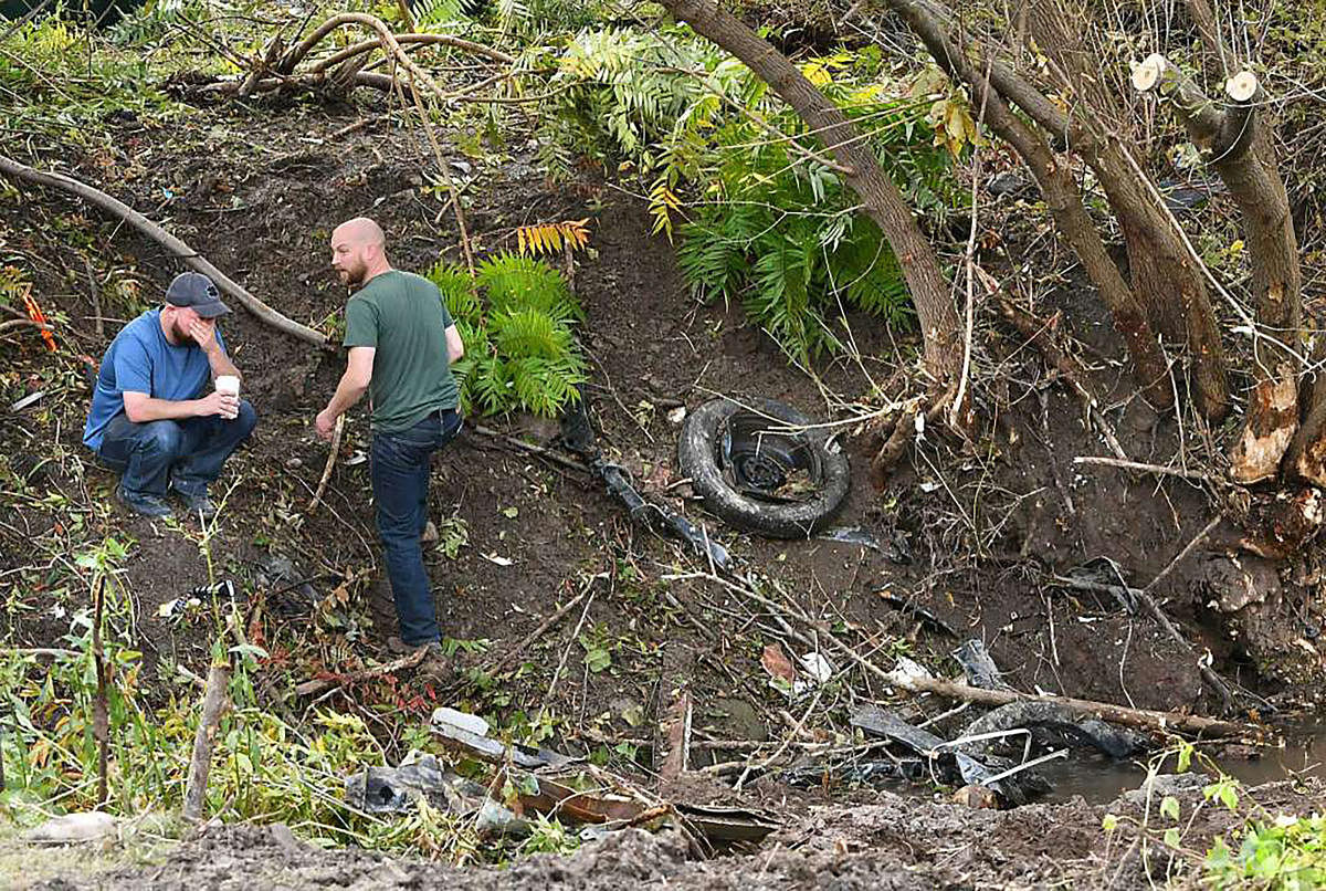 Distraught family members take in the scene October 7, 2018 in Schoharie, New York, one day after an accident in Schoharie, New York, that left 20 people dead. - Twenty people were killed in a limousine crash in New York state, police confirmed, with loca