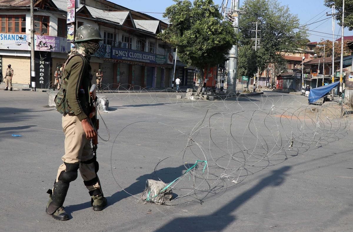 A complete shutdown is being observed in Kashmir valley following the JRL strike call against the Urban Local Bodies Election (ULBE) in Kashmir. (DH Photo/Umer Asif)