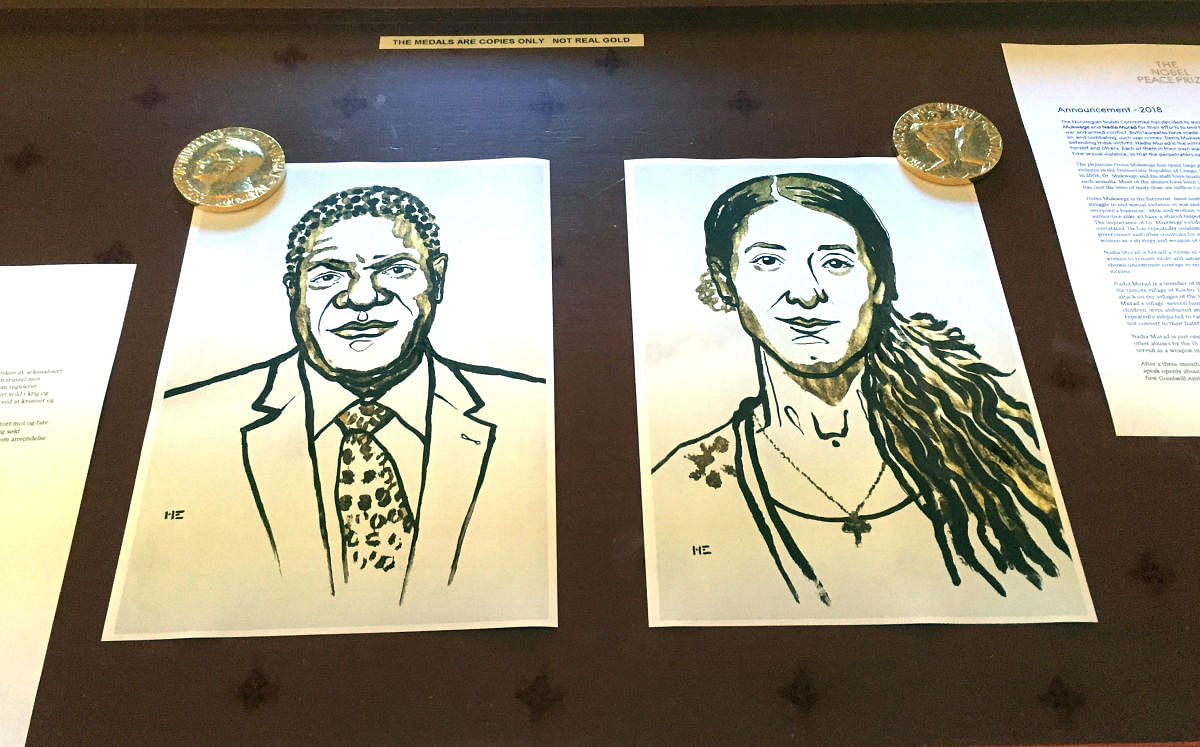 Drawings of the Nobel Peace Prize winners Denis Mukwege and Nadia Murad are displayed in Oslo, Norway. REUTERS