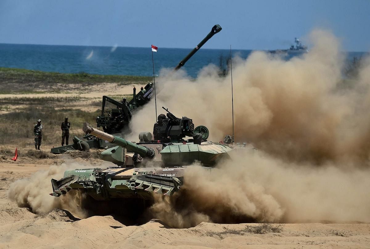 Armed Forces personnel stage a live demo in the presence of Defence Minister Nirmala Sitharaman (unseen) after the Curtain Raiser press Conference of DefExpo2018 in Chennai. PTI