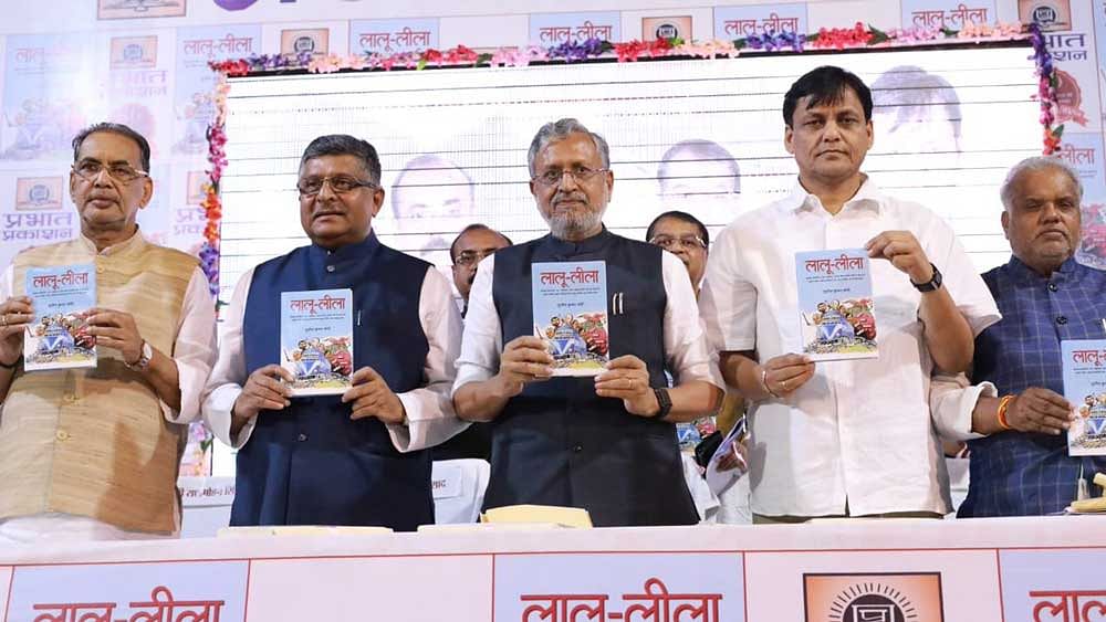 The book was released at a programme in Patna on Thursday. (Image: Twitter/@SushilModi)
