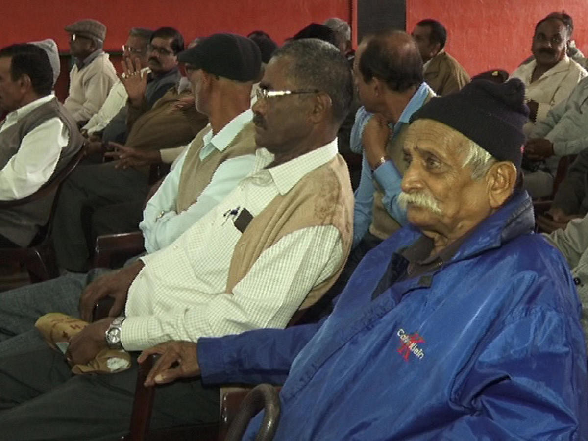 Ex-servicemen take part in a get-together at Kodava Samaja in Madikeri on Sunday.
