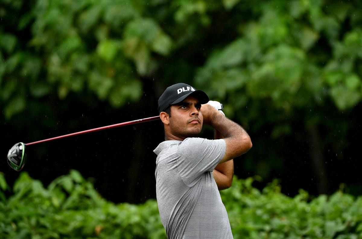 Shubhankar Sharma watches his tee shot during the opening round of the CIMB Classic on Thursday. AFP