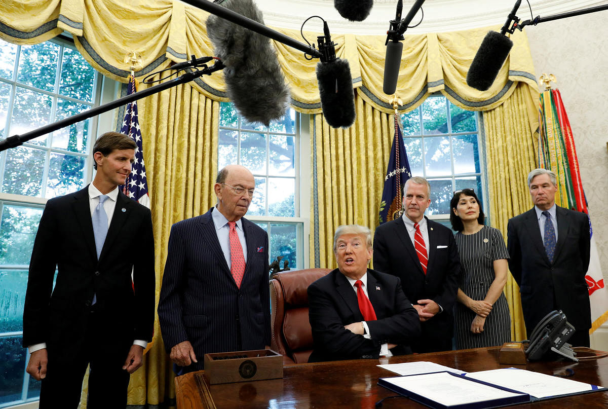 U.S. President Donald Trump speaks about Hurricane Michael prior to signing the "Save Our Seas Act of 2018" at the White House in Washington, U.S., October 11, 2018. (REUTERS)