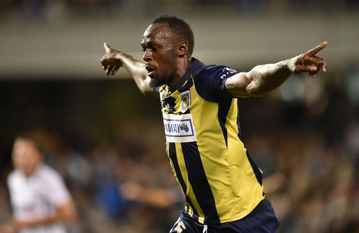 Olympic sprinter Usain Bolt celebrates after scoring for Central Coast Mariners against Macarthur South West United in an A-League match in Sydney on Friday. AFP