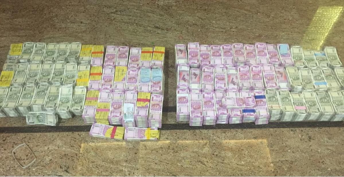 The money seized from the premises of one of the contractors. dh photo