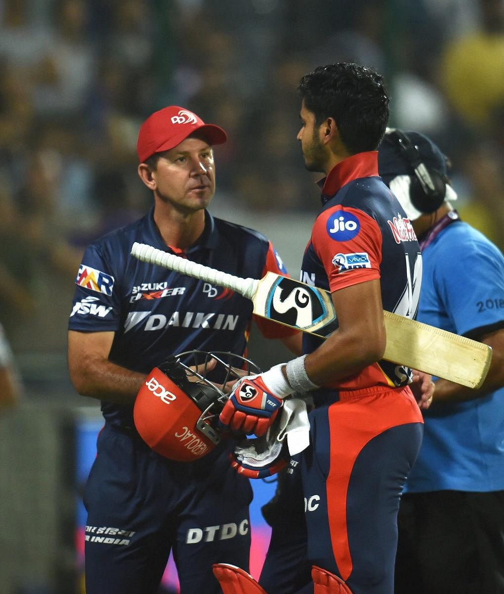 Delhi Daredevils' skipper Shreyas Iyer (right) is greeted by team coach Ricky Ponting during their match against Kolkata Knight Riders in New Delhi, on Friday. PTI