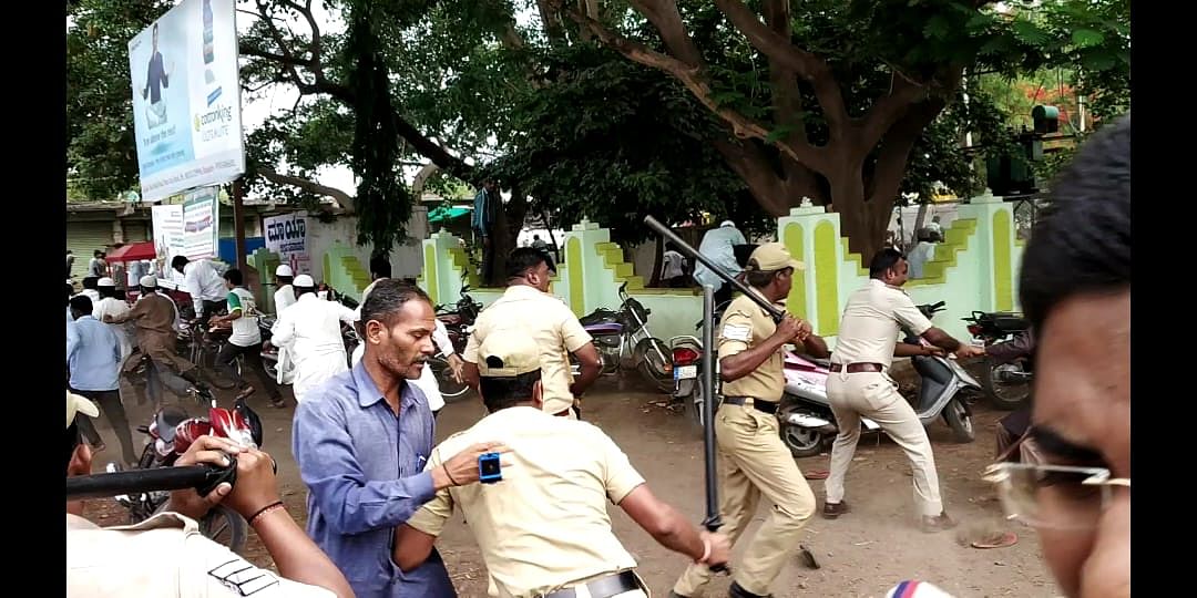 Police caned the unruly mob and arrested over 20 protesters. 