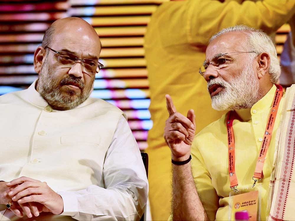 Amit Shah and Narendra Modi. PTI file photo