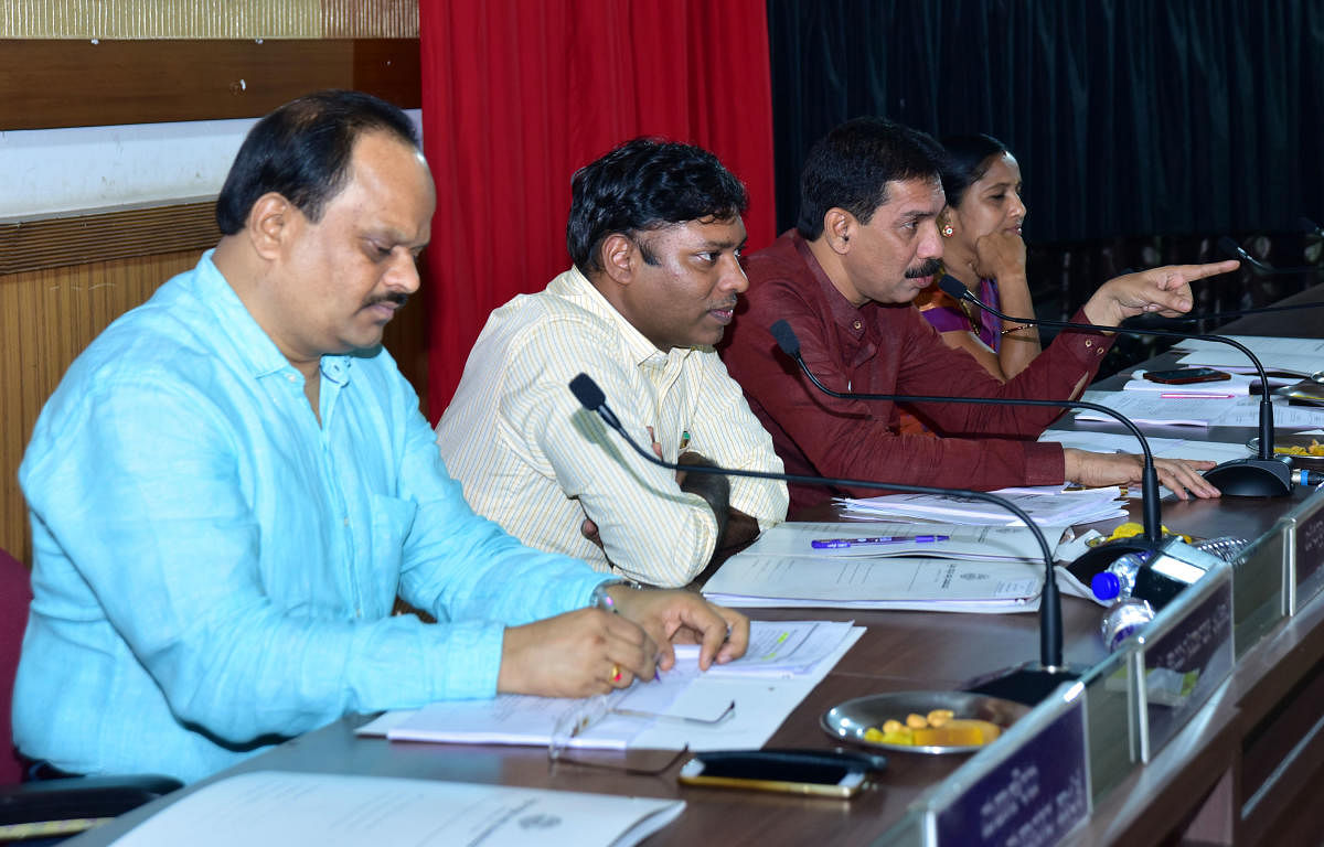 MP Nalin Kumar Kateel speaks at the Development Coordination and Monitoring Committee meeting in Mangaluru on Saturday.
