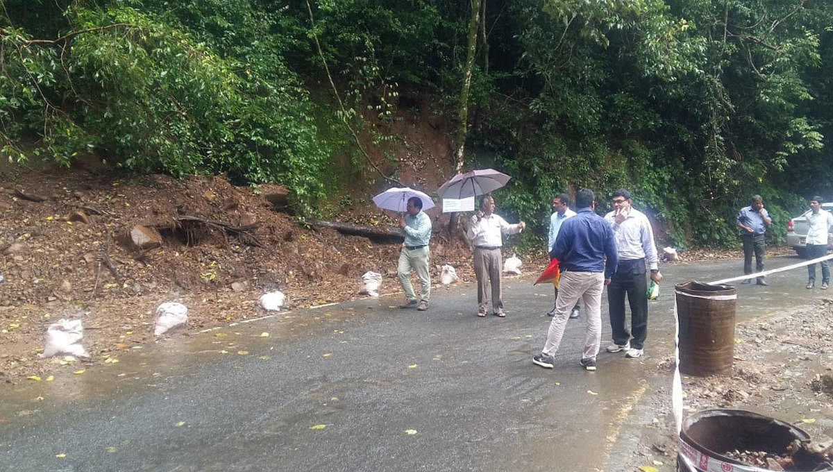 Experts from NITK, Surathkal inspect the Perumbadi-Makutta Road near Virajpet on Tuesday.