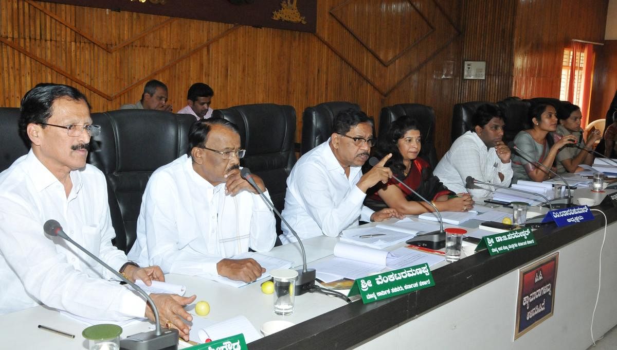 Deputy chief minister and district in-charge minister G Parameshwara warned of action against deputy commissioner Dr K Rakesh Kumar and Zilla Panchayat Chief Executive Officer (CEO) Annies Kanmani Joy of disciplinary action if they failed to take action against inactive subordinates who have failed to implement government projects.
