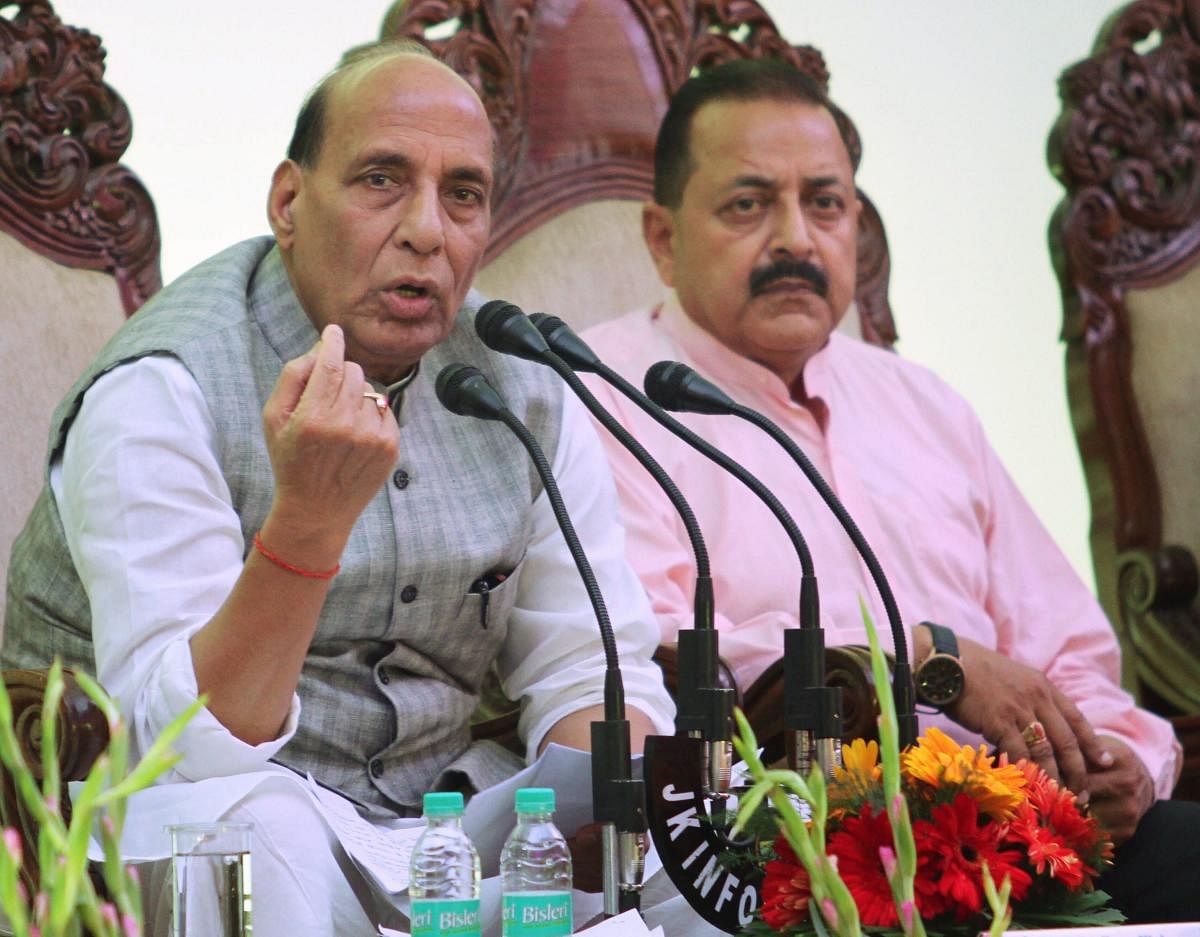 Union Home Minister Rajnath Singh addresses a press conference, in Jammu on Friday, June 08, 2018. PMO MoS Jitendra Singh is also seen. (PTI Photo)