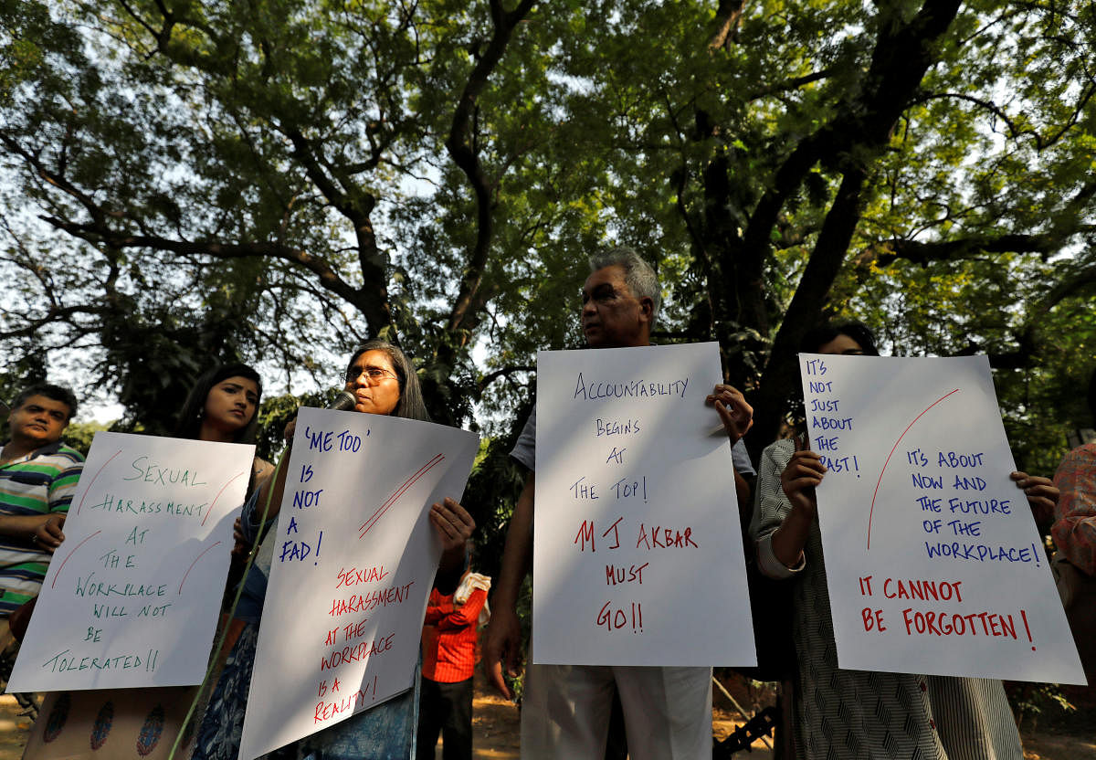 Journalists hold placards during a protest against what they say is sexual harassment in the workplace in New Delhi on Saturday. REUTERS