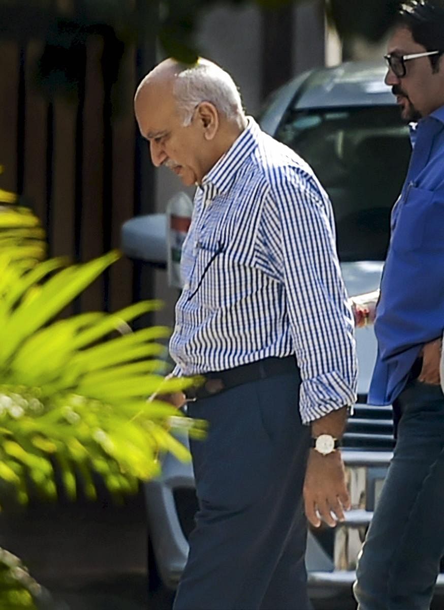 Union minister M J Akbar (L), who is facing allegations of sexual harassment by a number of women journalists, at his residence after his arrival from a foreign tour, in New Delhi, on Sunday. PTI