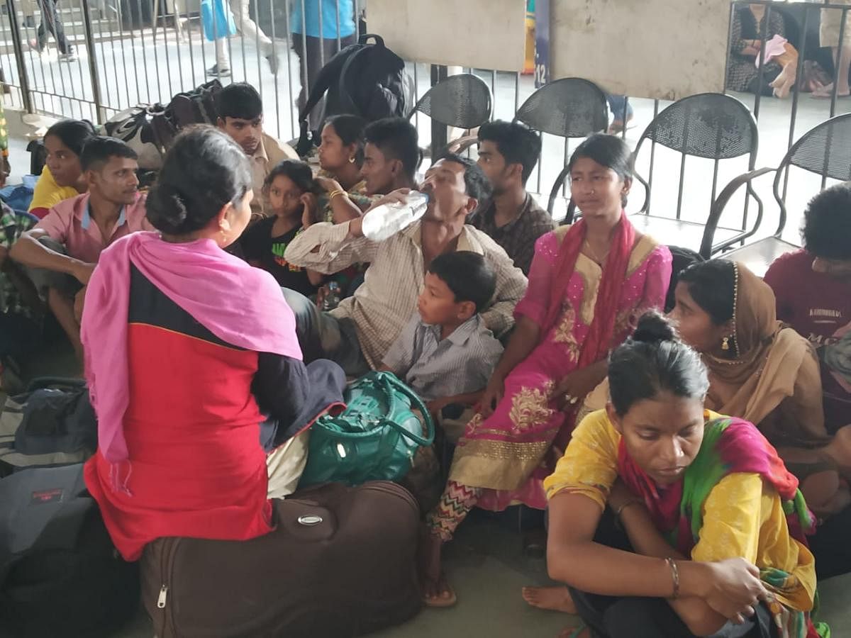 The detained Bangladeshis in Guwahati railway station on Monday. Photo by Manash Das