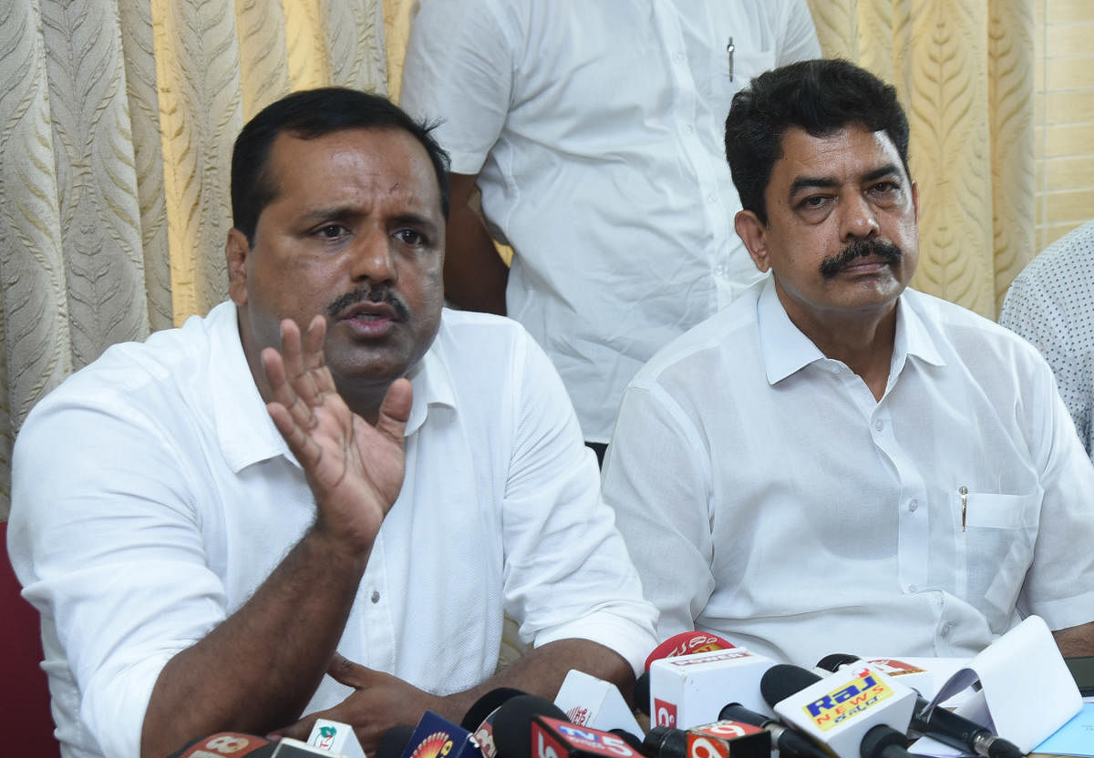 Urban Development and Housing Minister U T Khader addresses a press meet in Mangaluru on Tuesday. 