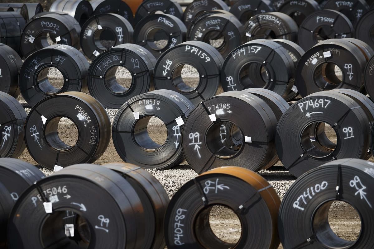 In this file photo taken on June 4, 2018, steel coils lay in a yard at ArcelorMittal Dofasco steel plant in Hamilton, Canada.